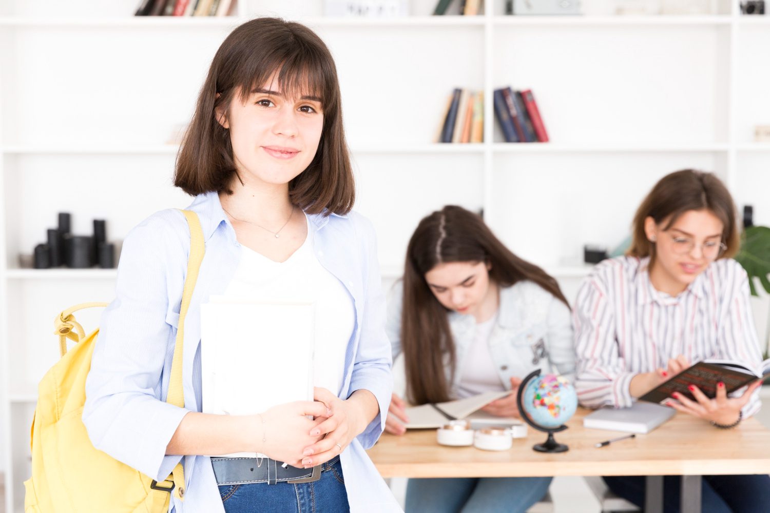 Female students in library<br />
